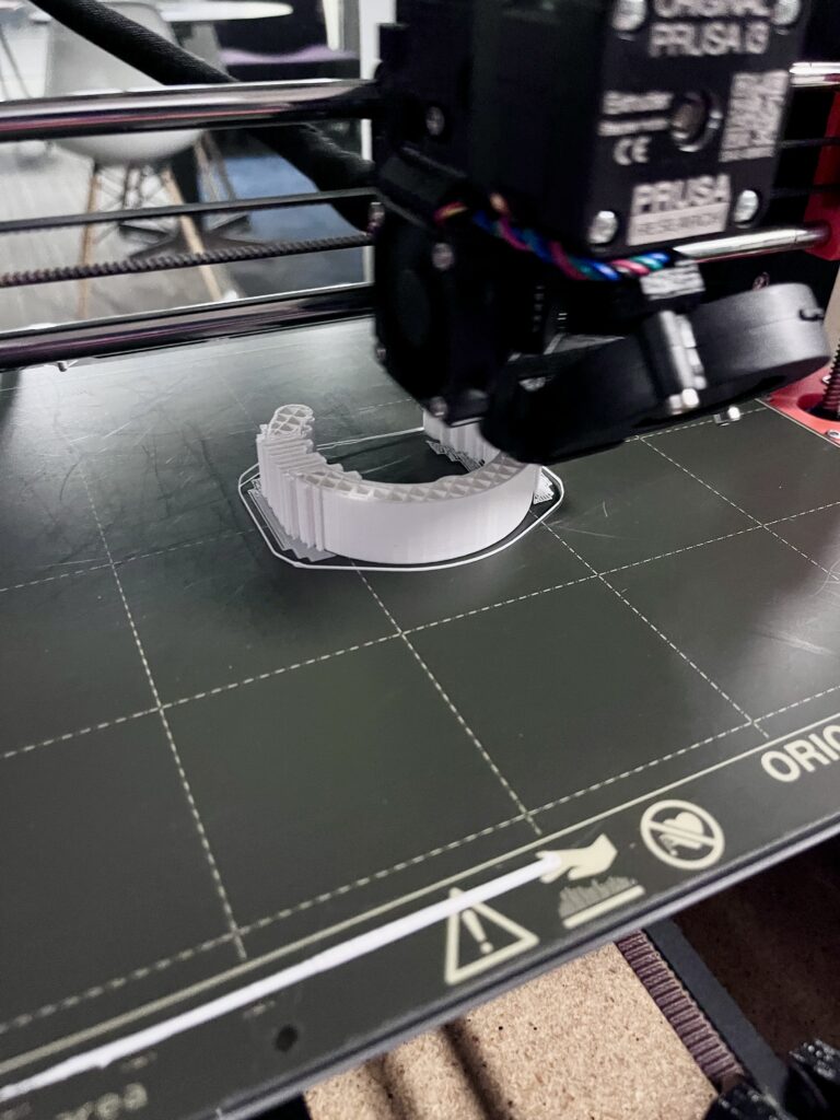 Design 3.1 as it is being printed on a 3D printer